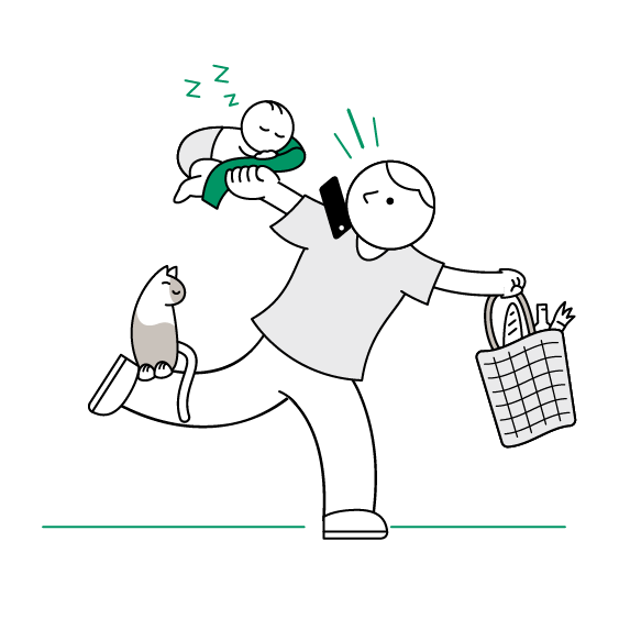Busy dad on phone with baby in one hand, basket of shopping in the other and cat on leg
